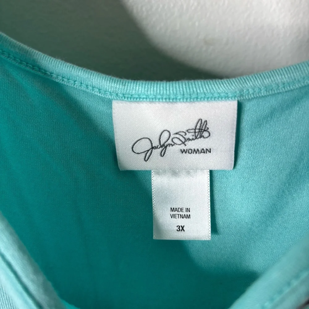 Jaclyn Smith chic turquoise